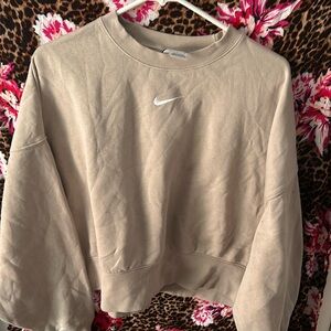 Light tan cropped Nike sweater